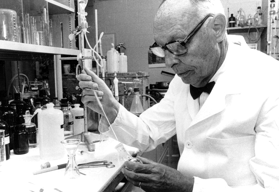 Dr. Hofmann, pipetting a reagent in the course of biotinylating a peptide.