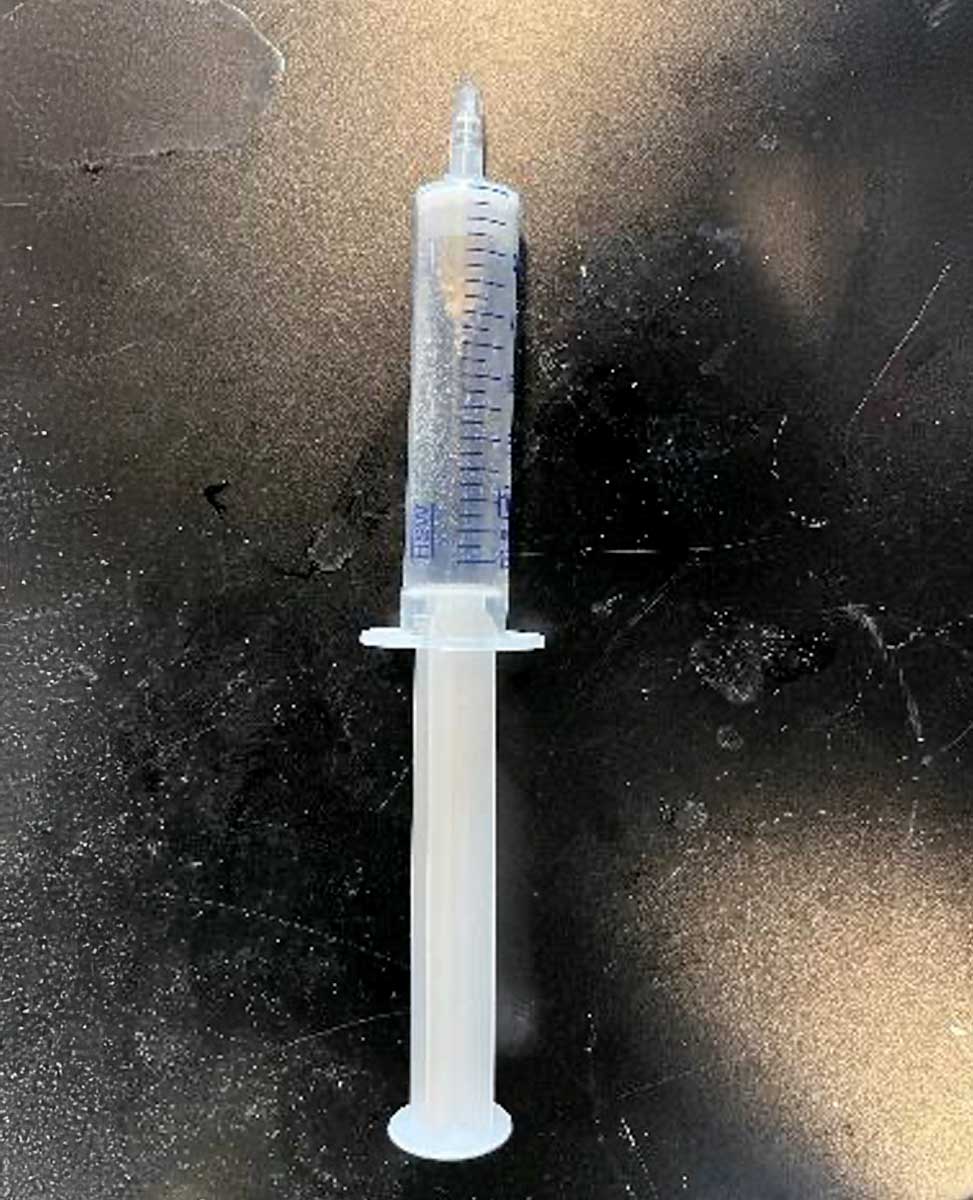 Fritted syringe component